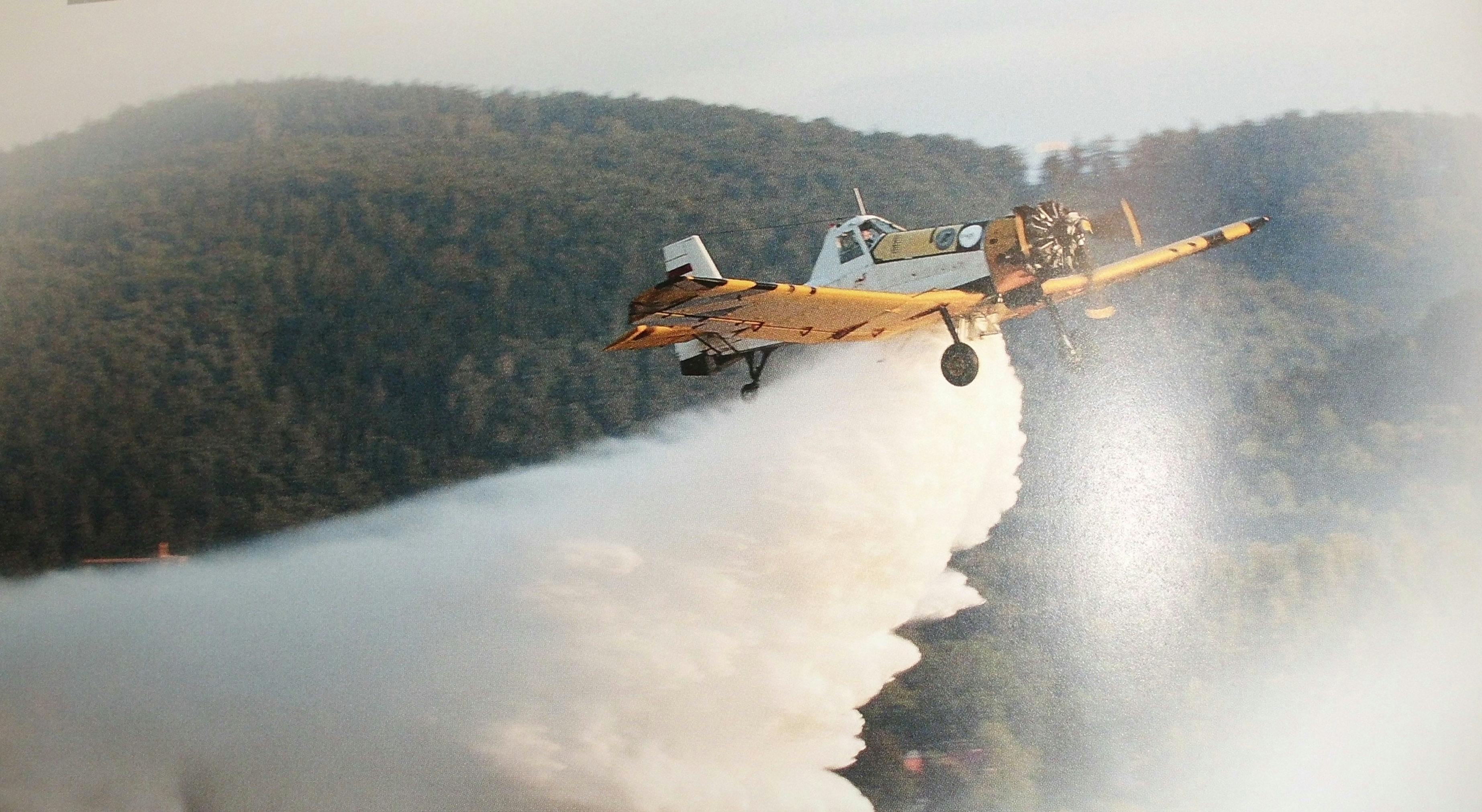 Chile, early 21st century. A Polish Dromader plane extinguishes a forest fire.